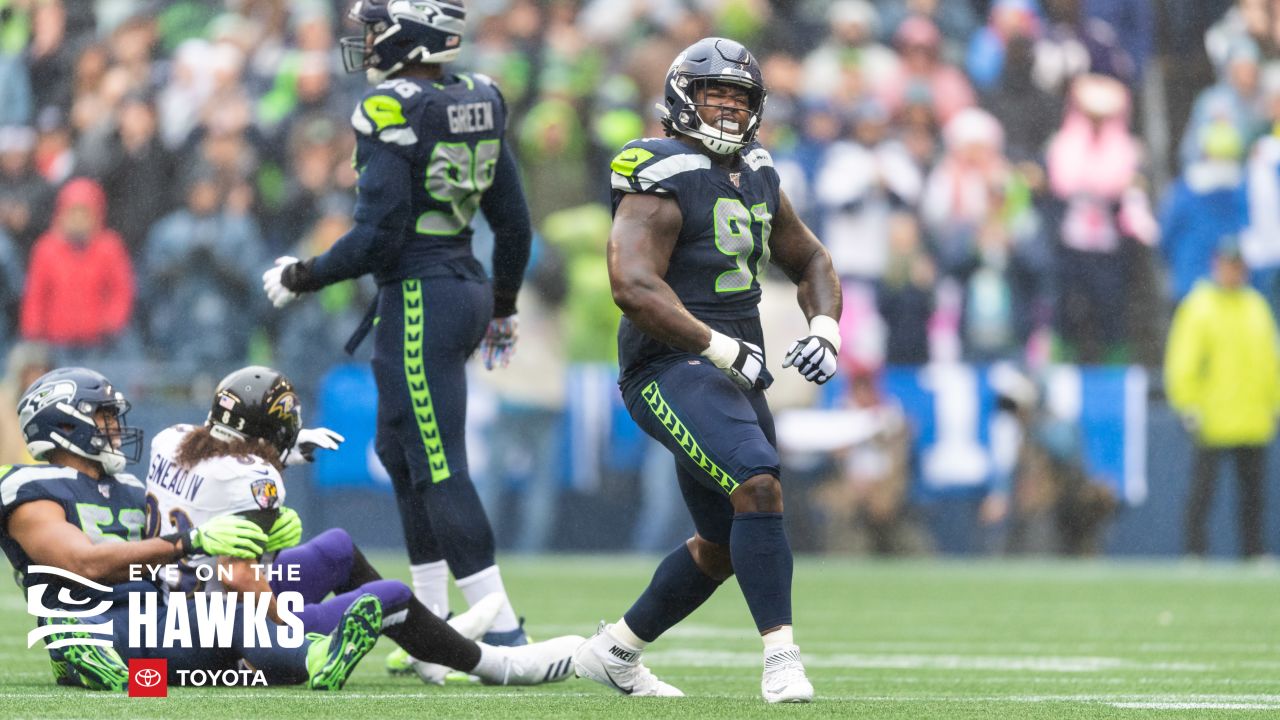 DK Metcalf of the Seattle Seahawks reacts after diving to make a