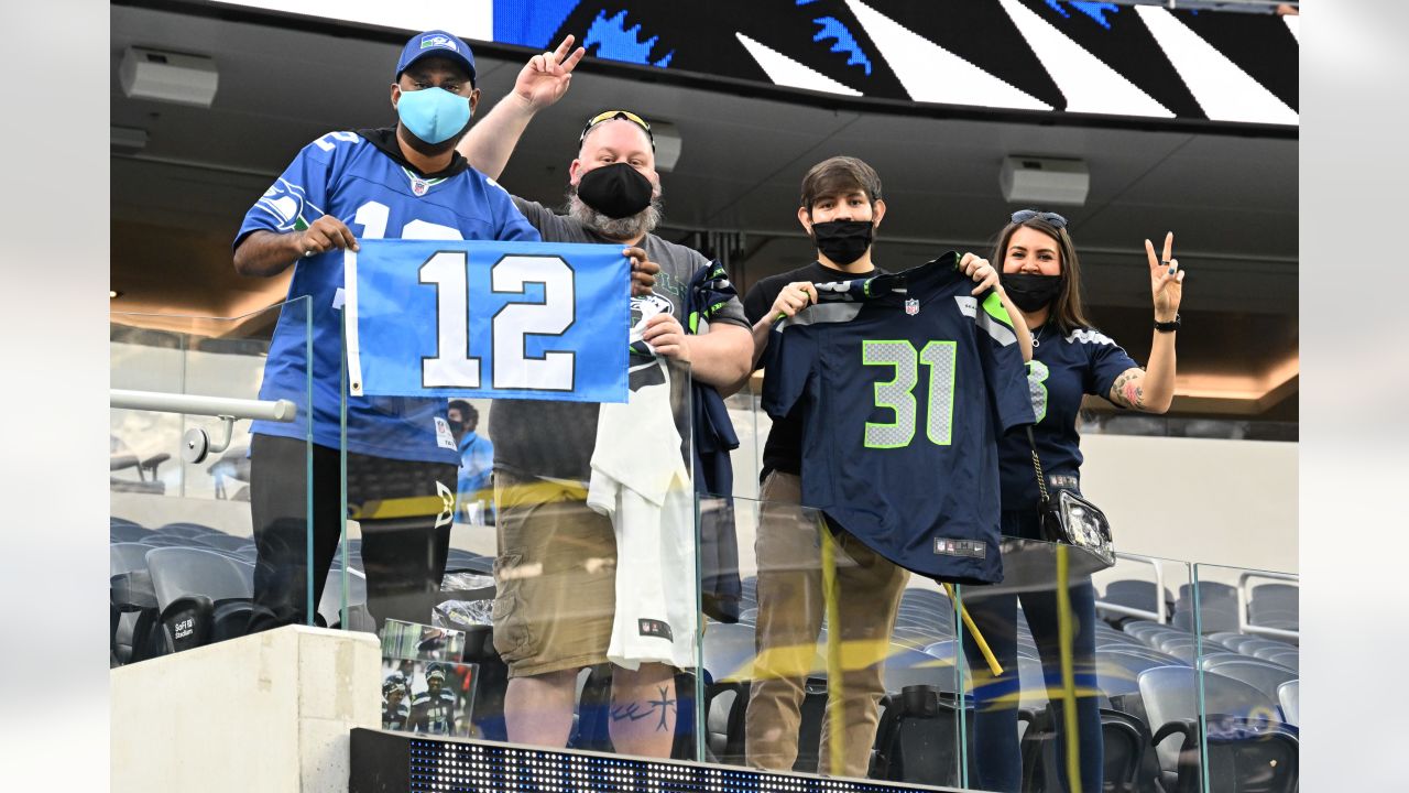 Seattle Seahawks Vs. Los Angeles Rams. Fans Support On NFL Game. Silhouette  Of Supporters, Big Screen With Two Rivals In Background. Stock Photo,  Picture And Royalty Free Image. Image 151158439.