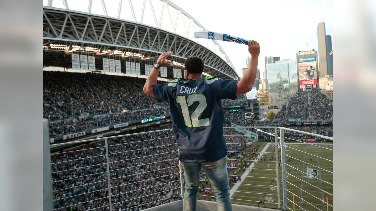 Nelson Cruz Raises 12th Man Flag at Seahawks Game, by Mariners PR