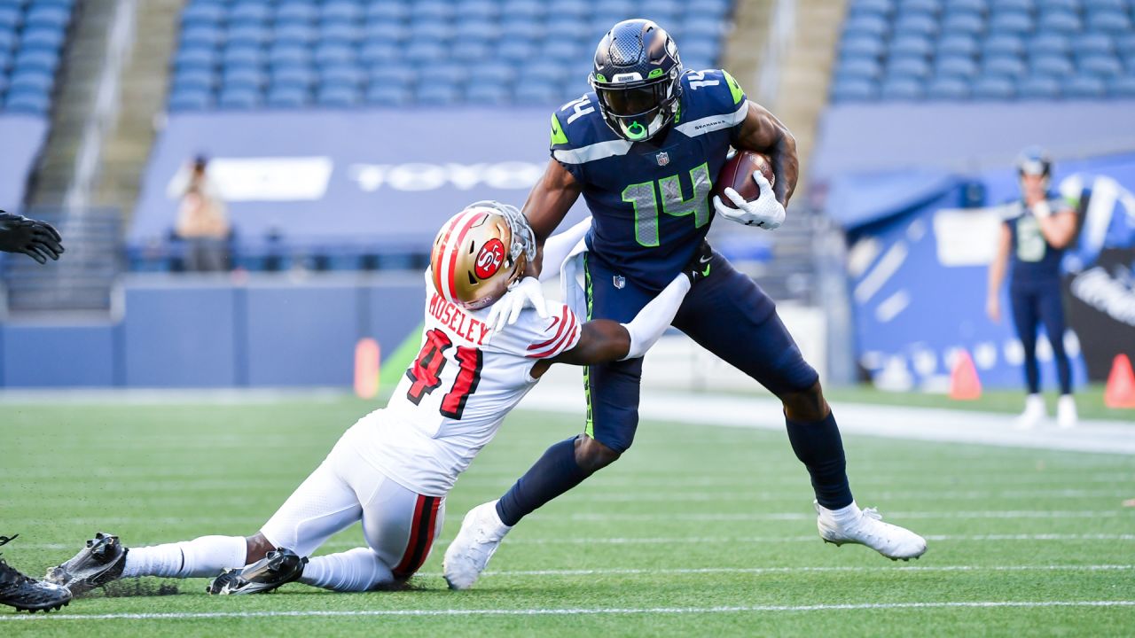 Seattle, United States. 30th Dec, 2019. Seattle Seahawks wide receiver D.K.  Metcalf (14) catches a 14 yard touchdown against San Francisco 49ers  cornerback Ahkello Witherspoon (23) during the fourth quarter at CenturyLink