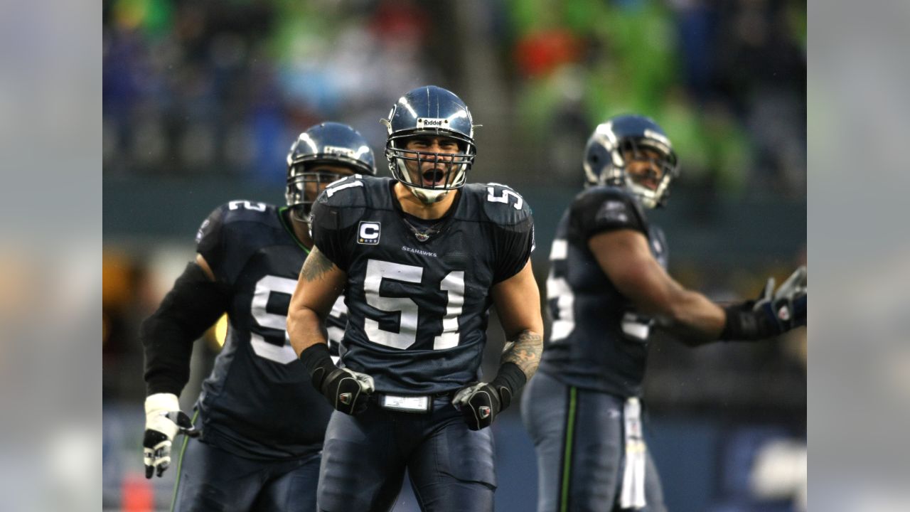 Seattle Seahawks Lofa Tatupu takes the field before the action against the  New York Giants in an NFL football game, Sunday, Nov. 7, 2010, in Seattle.  (AP Photo/Ted S. Warren Stock Photo 