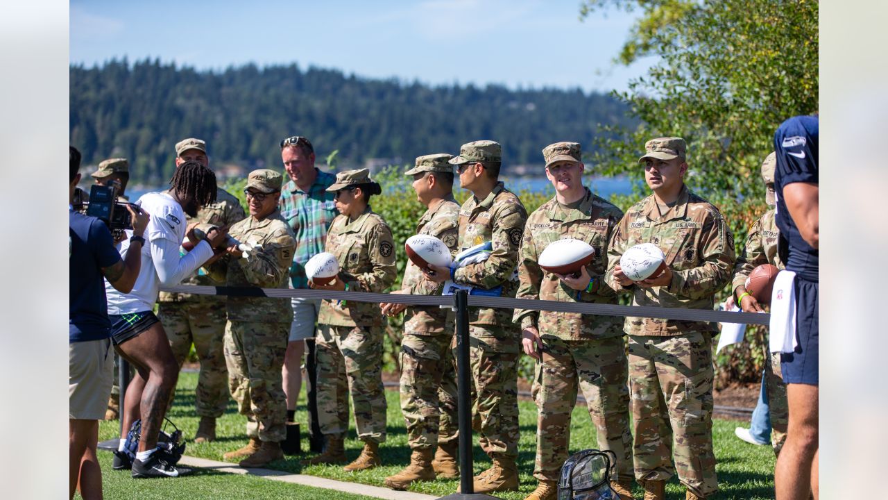 Seattle Seahawks - Lock taking time to meet with our military at practice  yesterday. Salute to service moment presented by USAA #SaluteToService