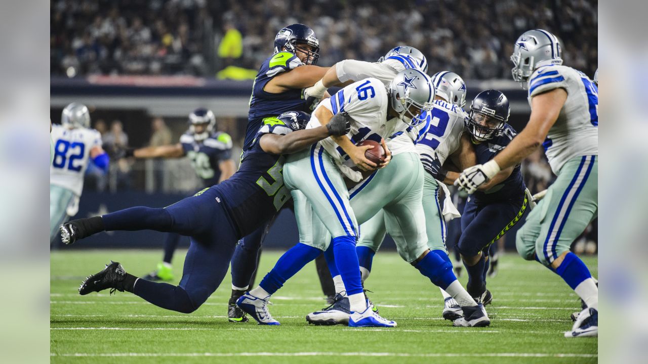 Seattle Seahawks defensive end Cliff Avril (56) celebrates after sacking  New Orleans Saints quarterback Drew Brees during the third quarter of an  NFC divisional playoff NFL football game in Seattle, Saturday, Jan.