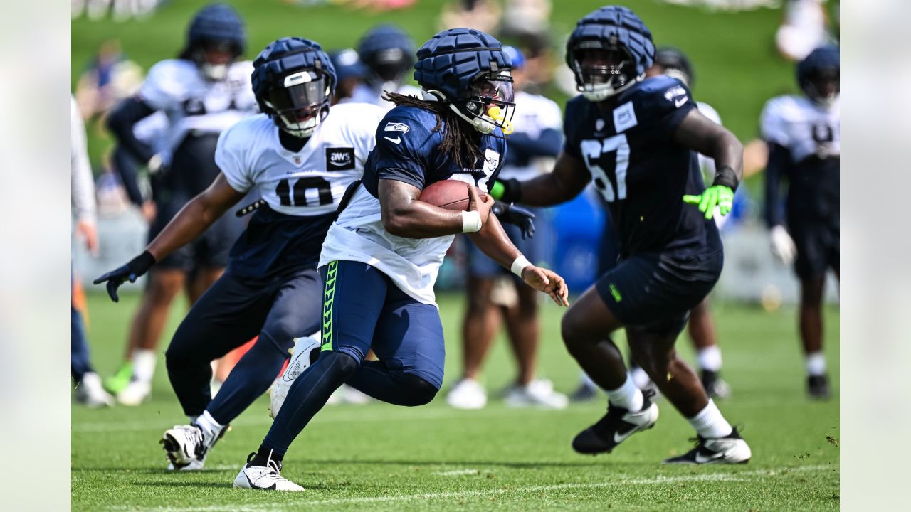 Tariq Woolen knee surgery. Seahawks eye training camp return