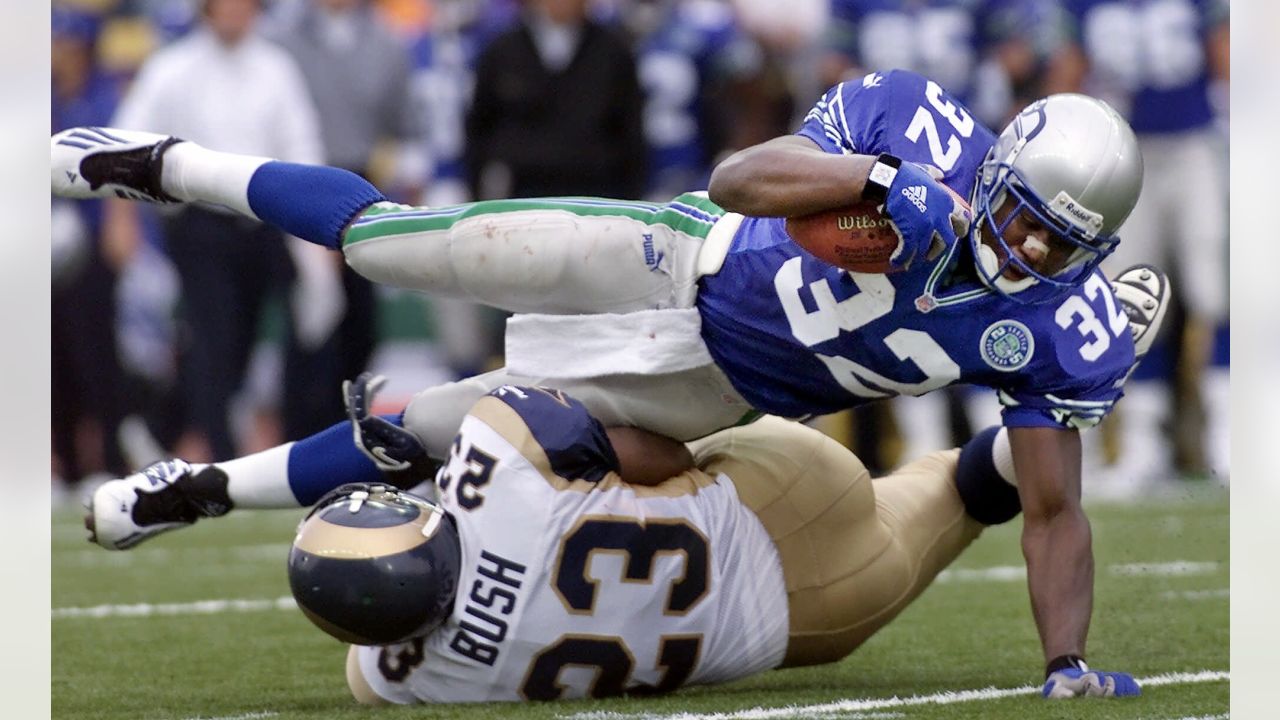 Seattle Seahawks running back Ricky Watters carries the ball