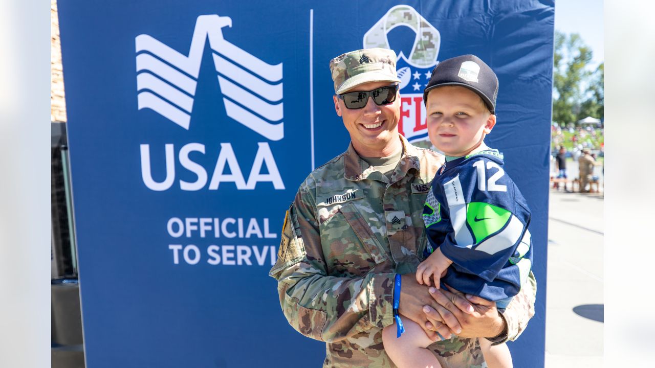 Seattle Seahawks - Lock taking time to meet with our military at practice  yesterday. Salute to service moment presented by USAA #SaluteToService