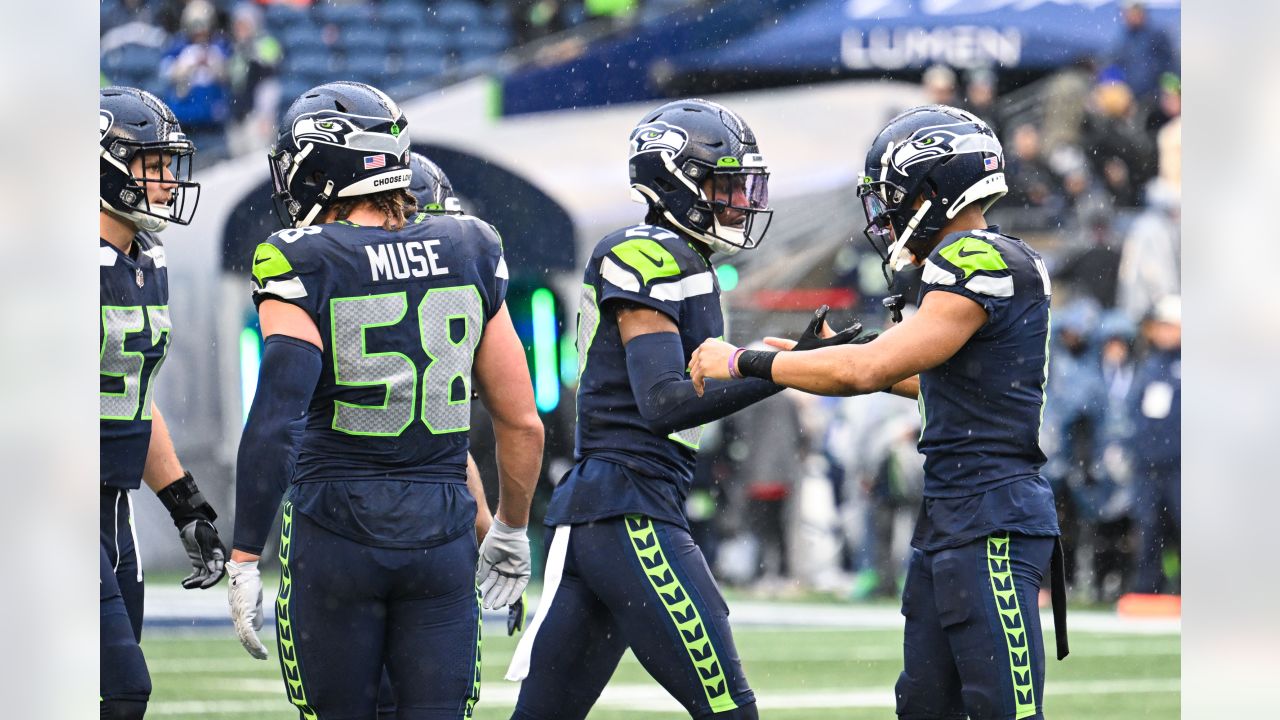 NFL Hall of Famer Steve Largent presents the Steve Largent award to Seattle  Seahawks wide receiver Tyler Lockett (16) before an NFL football game  against the Los Angeles Rams, Sunday, Jan. 8