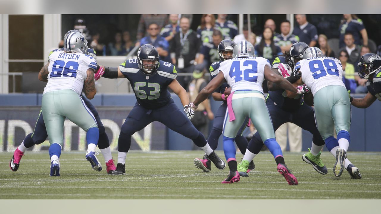 Chicago Bears wide receiver Bernard Berrian, left, catches a 40-yard pass  for a touchdown as Seattle Seahawks' Kelly Herndon, center, and Oliver  Celestin, right, defend during the third quarter of an NFL