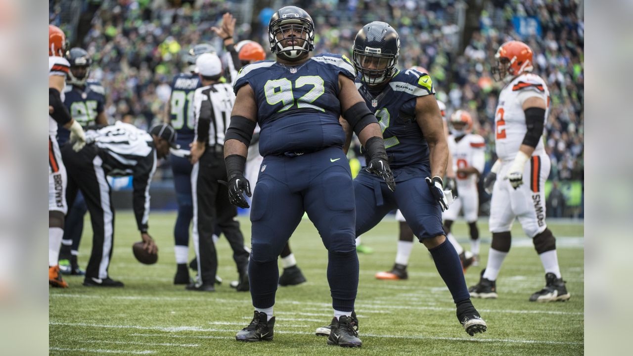 Seattle Seahawks running back Bryce Brown breaks a tackle by Cleveland  Browns defensive back Donte Whitner (31) at CenturyLink Field in Seattle,  Washington on November 29, 2015. The Seahawks clinched their fourth