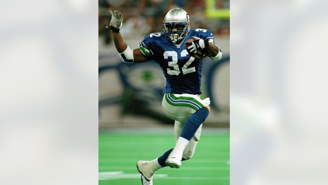 Ricky Watters of the Seattle Seahawks celebrates with Teammate