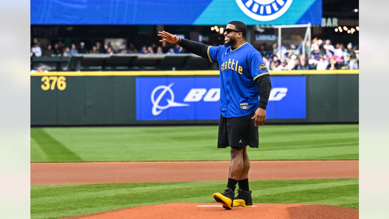 PHOTOS: Bobby Wagner Throws Out Ceremonial First Pitch At Mariners