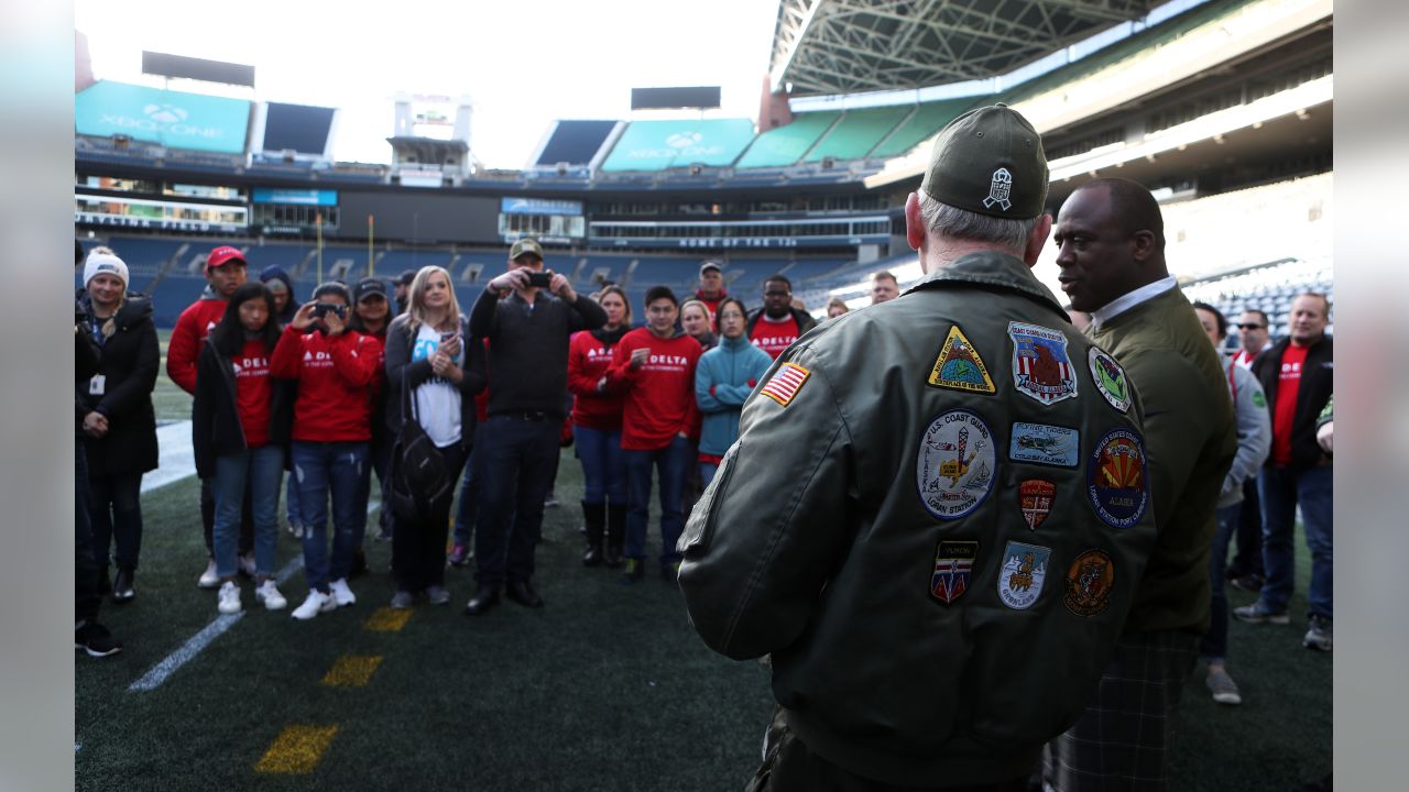 The U.S. Army Special Operations Command color guard presents the colors at  University of Phoenix Stadium prior to the NFL's Thursday Night Football, Arizona  Cardinals vs. Seattle Seahawks Salute to Service game