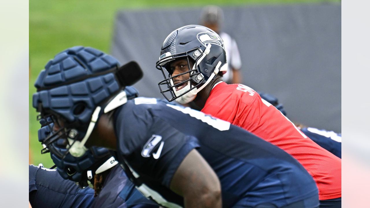 A Seattle Seahawks helmet rests on the field during NFL football practice  Monday, May 23, 2022, in Renton, Wash. (AP Photo/Ted S. Warren Stock Photo  - Alamy