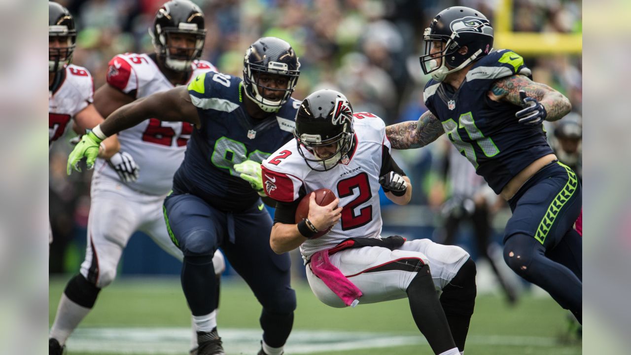 Keanu Neal keeps a Kam Chancellor jersey in his locker