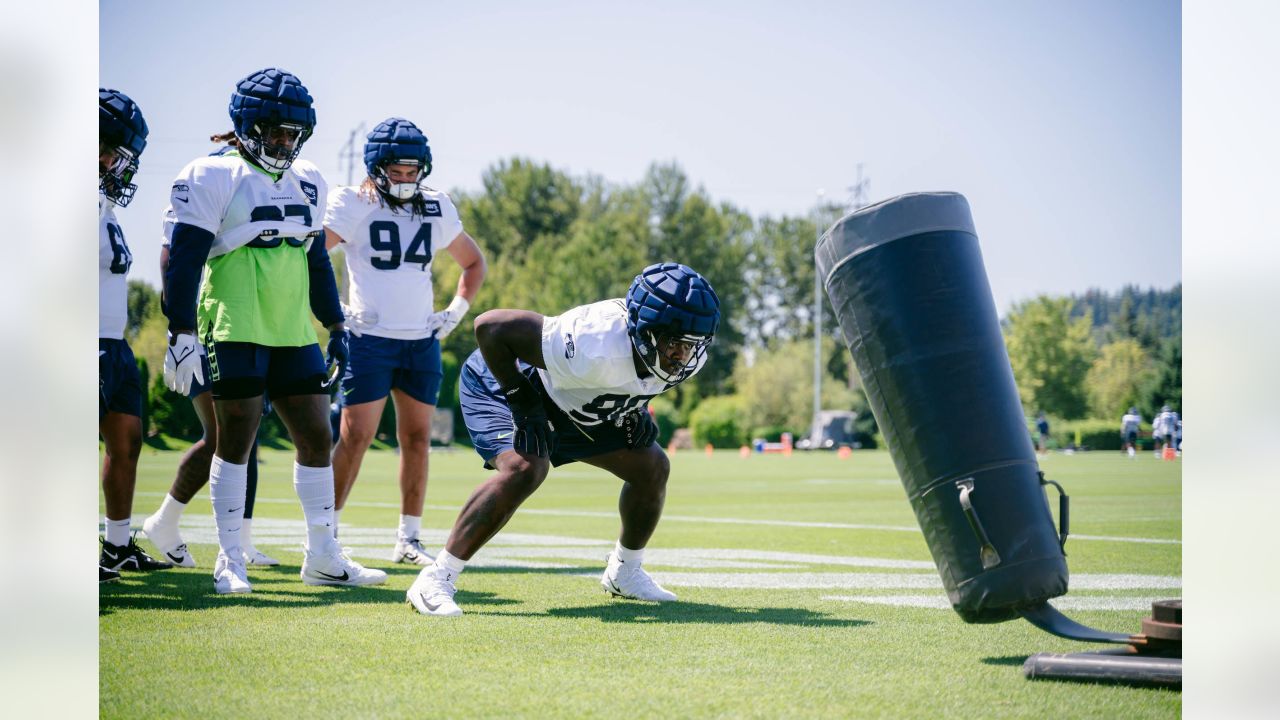 Seattle Seahawks - Lock taking time to meet with our military at practice  yesterday. Salute to service moment presented by USAA #SaluteToService