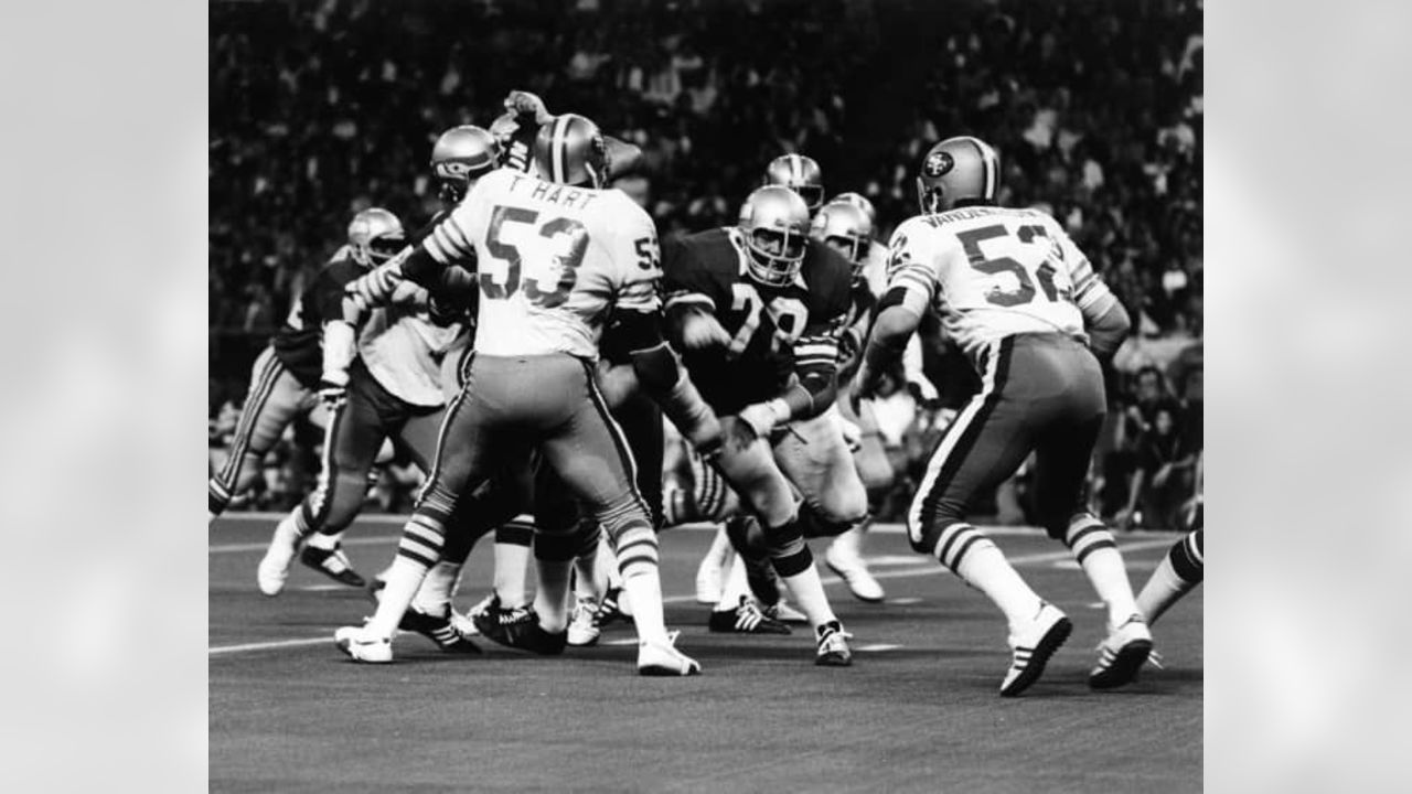 49ers 118 mac.jpg Seattle's full back 38- Mark Strong is tackled by 49ers  91- Anthony Adams, first quarter. San Francisco Forty Niners vs. Seattle  Seahawks Event in Seattle, Wa on 12/11/05. Photo