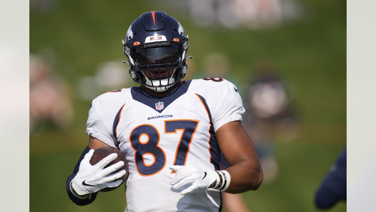 Seattle Seahawks tight end Noah Fant (87) warms up before an NFL