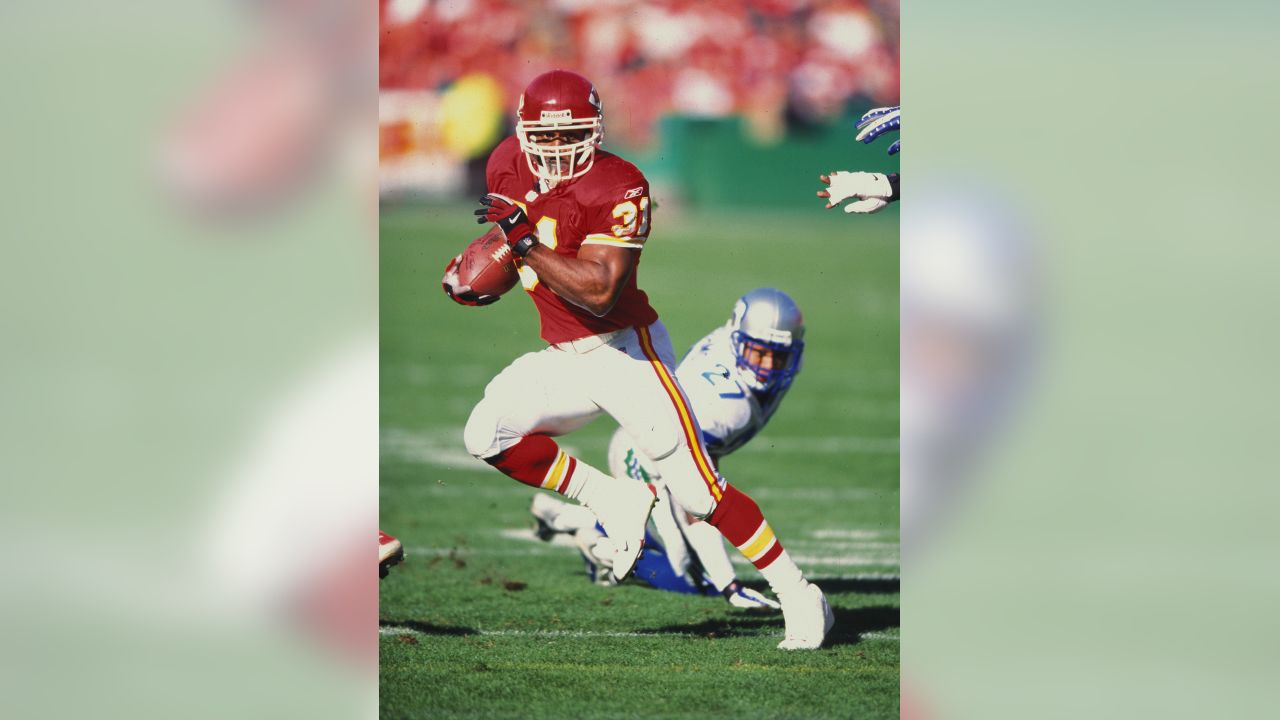 Seattle Seahawks - Seahawks quarterback Rick Mirer attempts to elude  Derrick Thomas during an NFL Football game against the Kansas City Chiefs  on January 2, 1994 in Kansas City, Missouri.