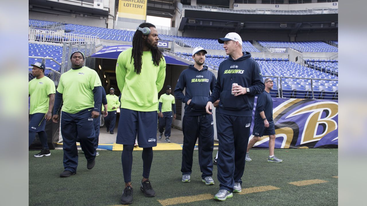 Seattle Seahawks cornerback Richard Sherman (25) and outside linebacker  K.J. Wright (50) team up to tackle Arizona Cardinals running back David  Johnson (31) at CenturyLink Field in Seattle, Washington on December 24