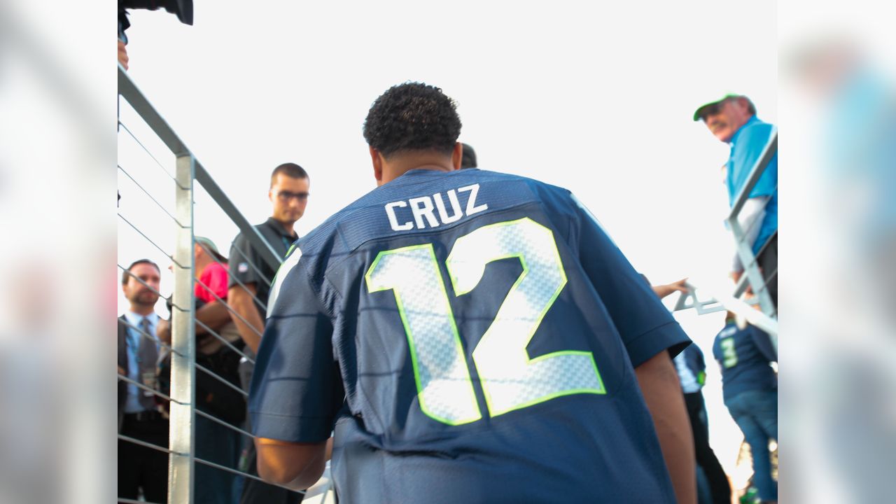 Nelson Cruz Raises 12th Man Flag at Seahawks Game, by Mariners PR