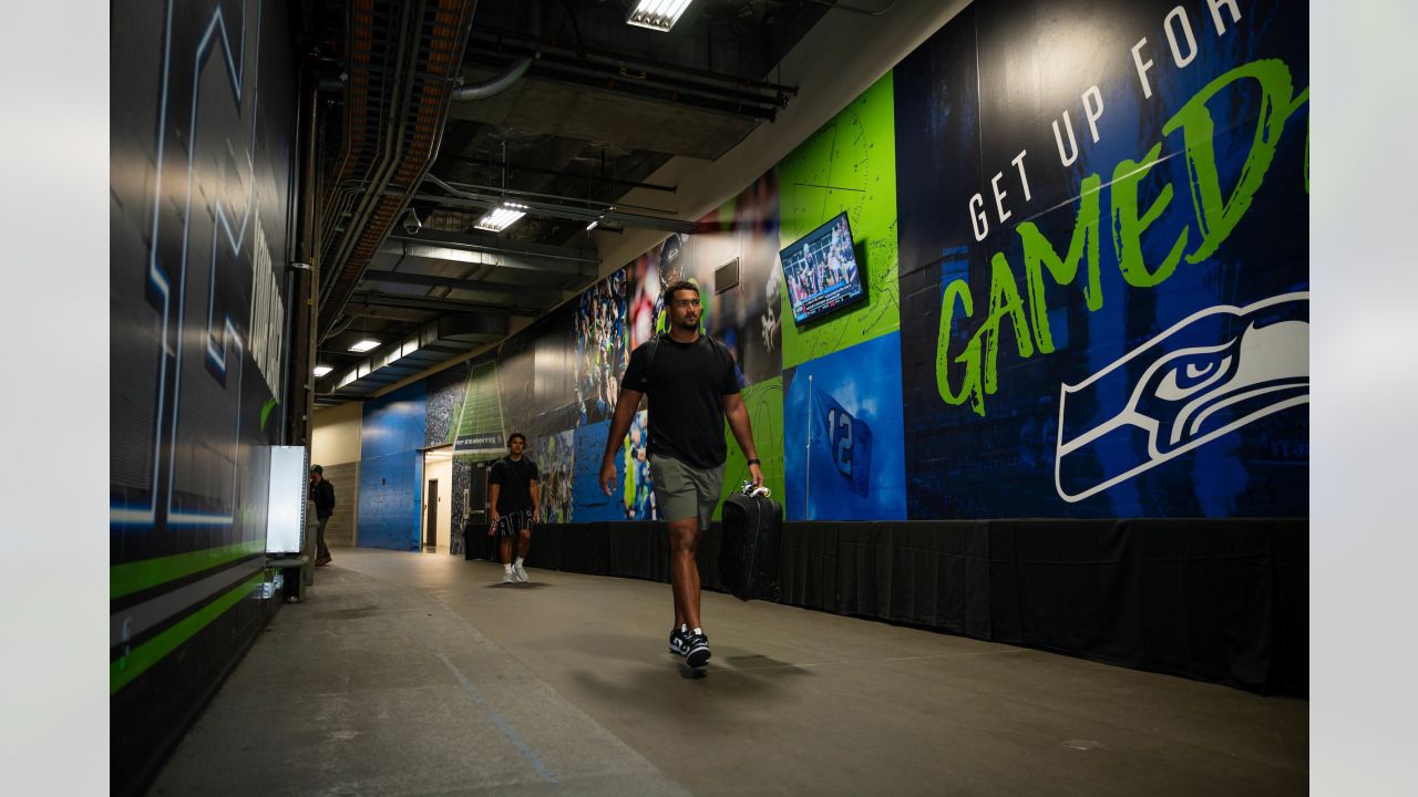 Seattle Seahawks tackle Jalen McKenzie (76) walks on the field