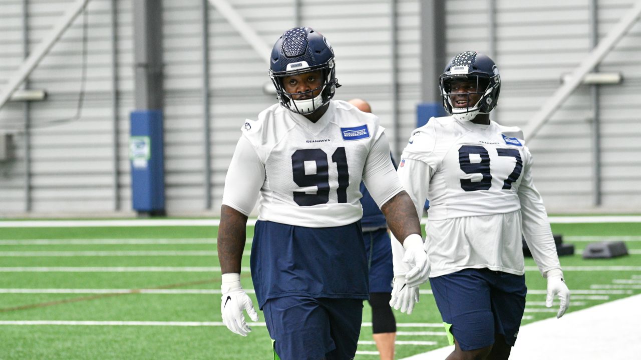 Seattle Seahawks defensive end Jarran Reed (90) walks onto the field during  minicamp Tuesday, June 6, 2023, at the NFL football team's facilities in  Renton, Wash. (AP Photo/Lindsey Wasson Stock Photo - Alamy