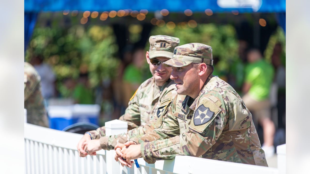 Seattle Seahawks - Lock taking time to meet with our military at practice  yesterday. Salute to service moment presented by USAA #SaluteToService