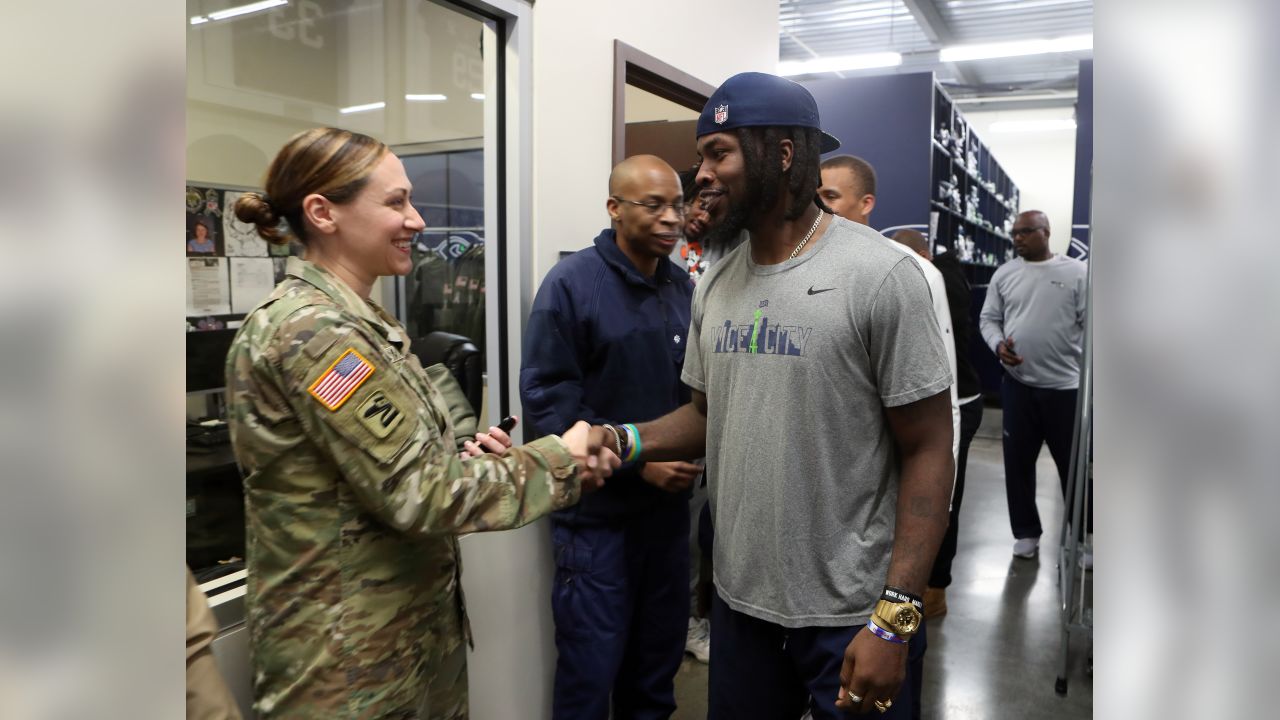 The U.S. Army Special Operations Command color guard presents the colors at  University of Phoenix Stadium prior to the NFL's Thursday Night Football, Arizona  Cardinals vs. Seattle Seahawks Salute to Service game