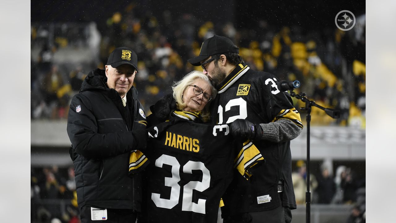 Franco Harris' widow on field in Pittsburgh as his No. 32 retired - WHYY