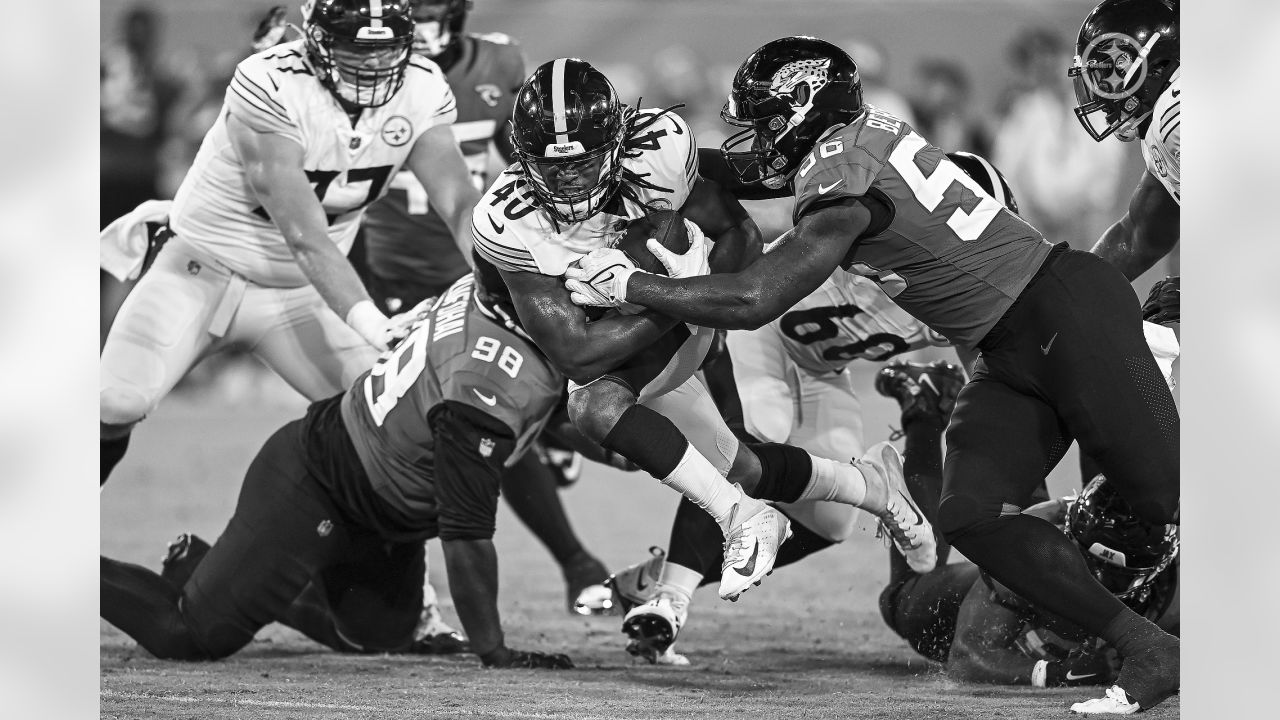 Pittsburgh Steelers defensive end DeMarvin Leal (98) sets up for a play  during the first half of a preseason NFL football game against the  Jacksonville Jaguars, Saturday, Aug. 20, 2022, in Jacksonville