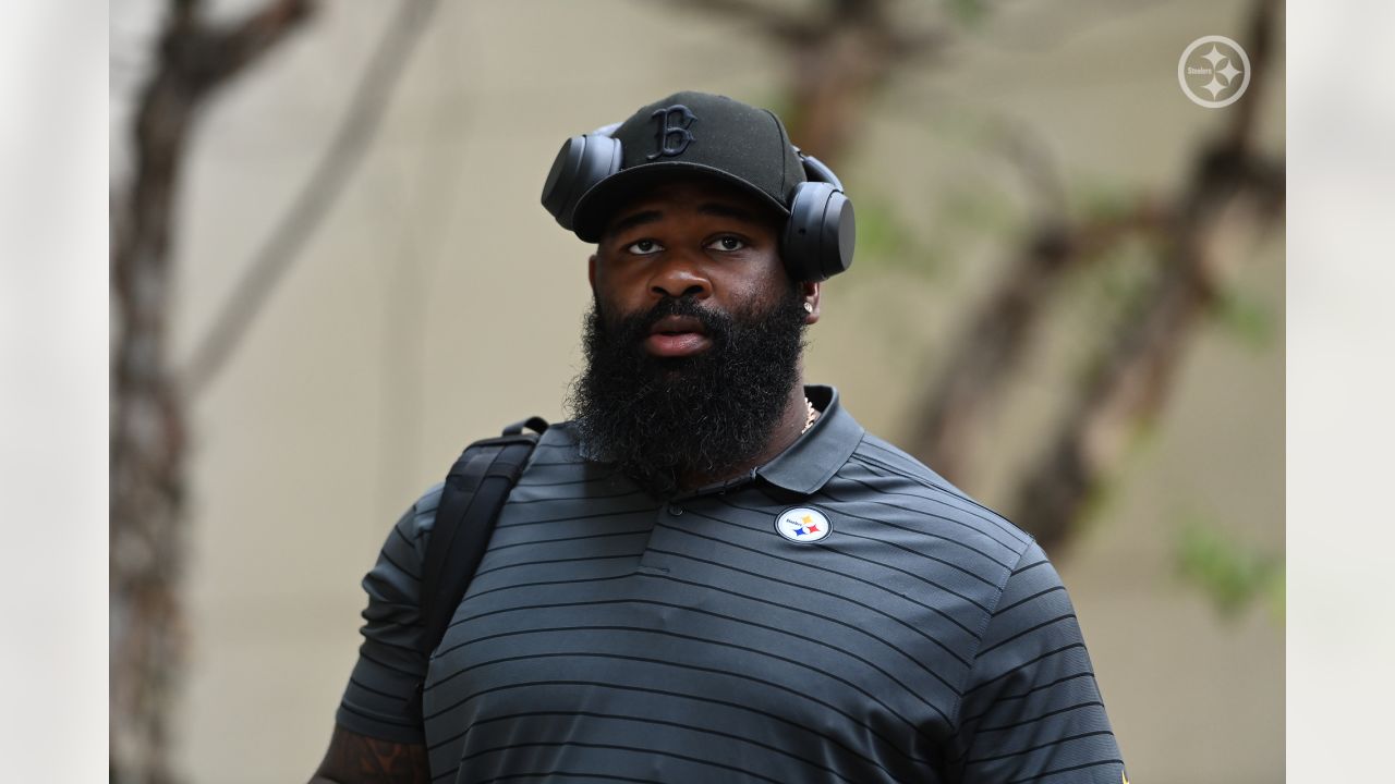 Pittsburgh Steelers running back Trey Edmunds (33) reaches for the ball  prior to an NFL preseason football game against the Carolina Panthers in  Charlotte, N.C., Thursday, Aug. 29, 2019. (AP Photo/Brian Blanco