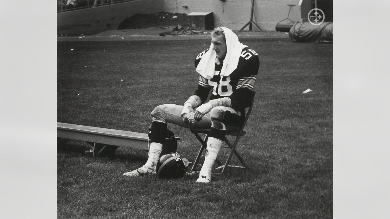 Steelers linebacker Jack Ham watches as a trainer untapes his shoes in  Pittsburgh on Sunday, Dec. 23, 1974 after 32-14 win over the Buffalo Bills.  Ham recovered a second quarter fumble, the