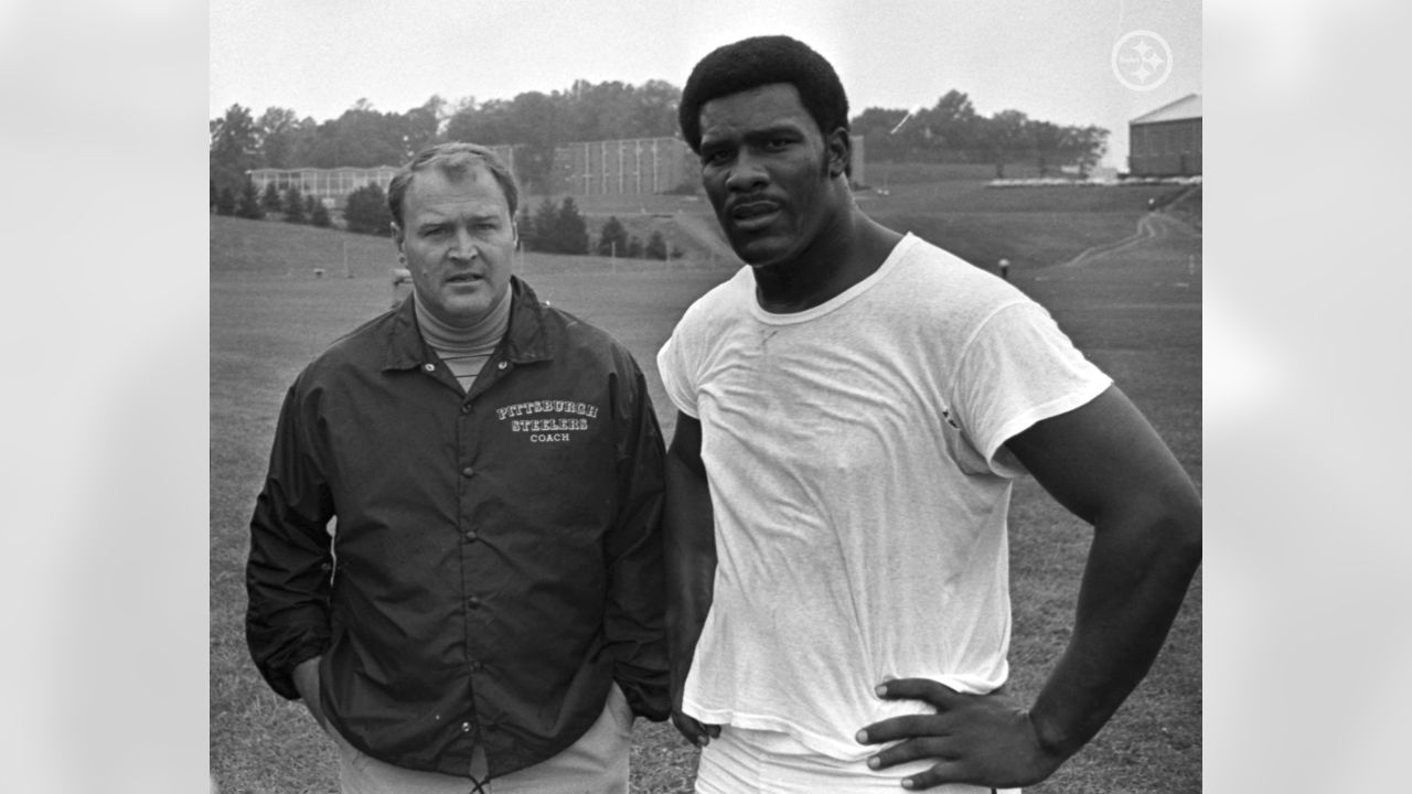 Mean Joe Greene showing off the rare all-white Pittsburgh Steelers