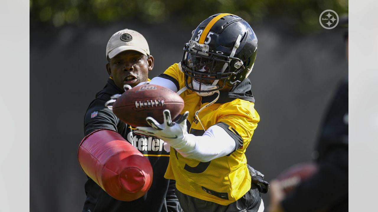 A Pittsburgh Steelers staff member wears a colorful Crucial Catch cap on  the sideline during an NFL football game between the Pittsburgh Steelers  and the Philadelphia Eagles , Sunday, Oct. 11, 2020