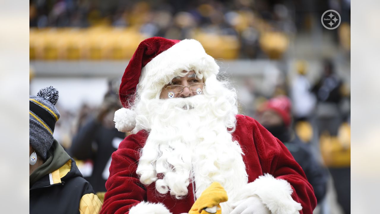 Pittsburgh Steelers fans dresses as Mr. and Mrs Santa Claus during the St.  Louis Rams game at Heinz Field in Pittsburgh, Pennsylvania on December 24,  2011. The Steelers defeated the Rams 27-0