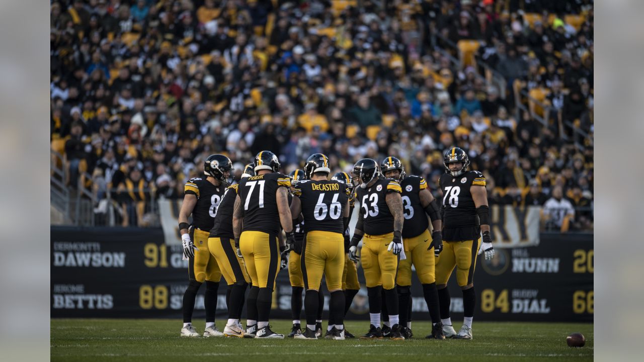 FILE - In this Dec. 13, 2015, file photo, a scrum breaks out on the field  between the Cincinnati Bengals and the Pittsburgh Steelers players during  practice before an NFL football game