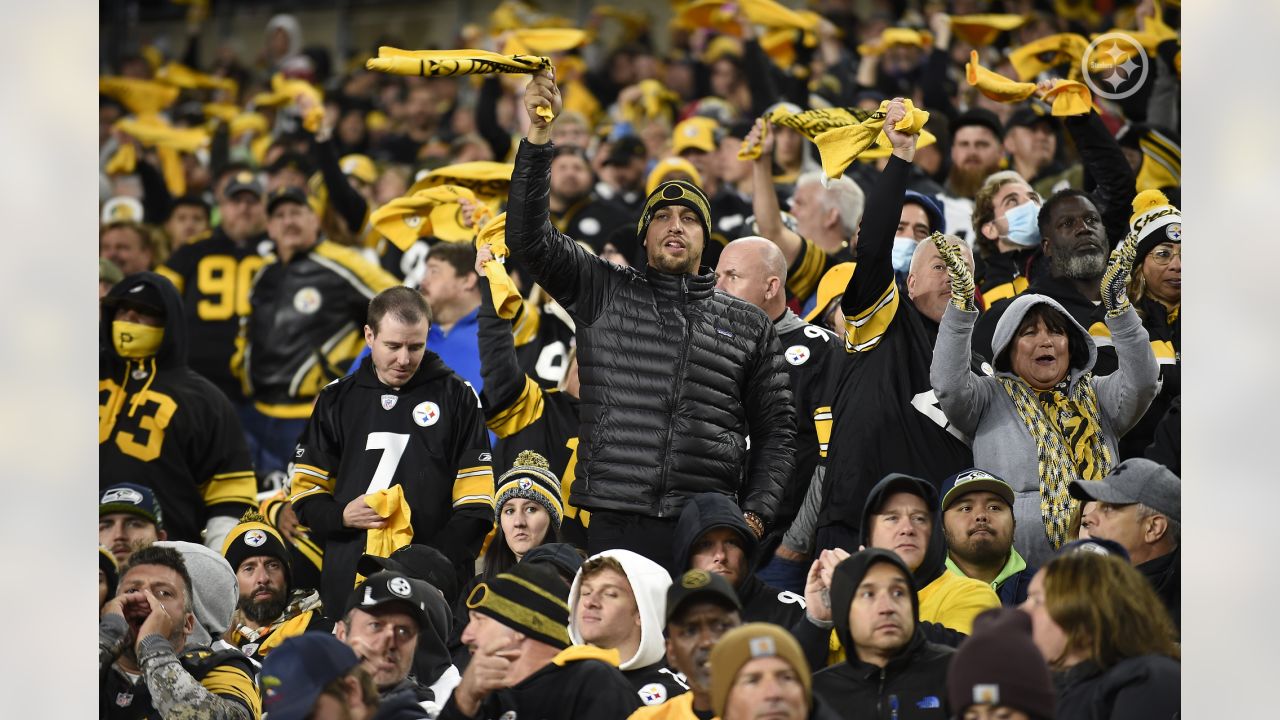 Fans wear Seattle Seahawks head gear as they watch warmups before an NFL  football game between the Pittsburgh Steelers and the Seattle Seahawks,  Sunday, Oct. 17, 2021, in Pittsburgh. (AP Photo/Fred Vuich