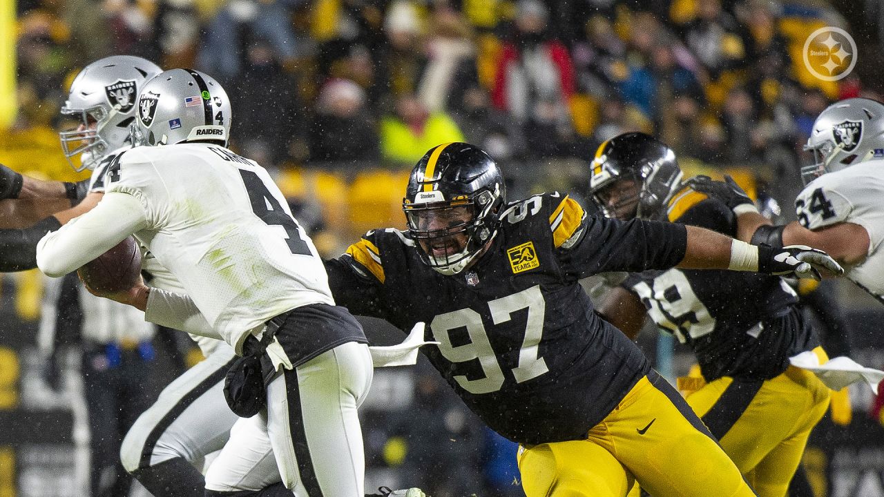 December 18, 2022: Pittsburgh Steelers defensive tackle Cameron Heyward  (97) celebrates with Pittsburgh Steelers safety Minkah Fitzpatrick (39)  after a sack during the second half of the NFL matchup against the Carolina