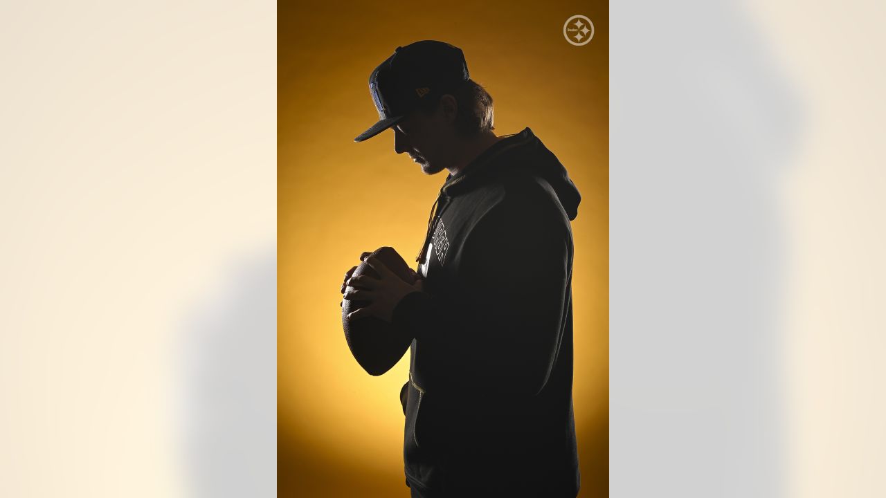 Quarterback Kenny Pickett, the Pittsburgh Steelers first-round draft pick,  poses with a jersey after meeting with reporters at the team's training  facility in Pittsburgh, Friday, April 29, 2022. (AP Photo/Gene J. Puskar