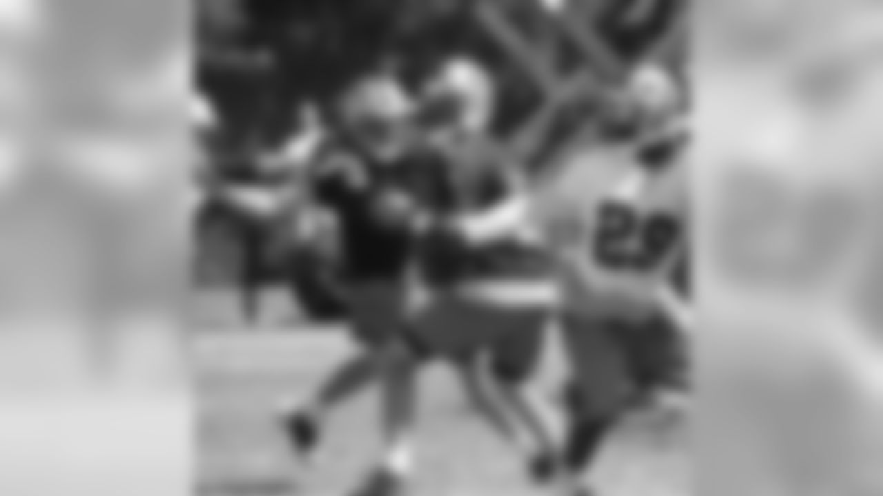LB Jay Moore rushes the passer