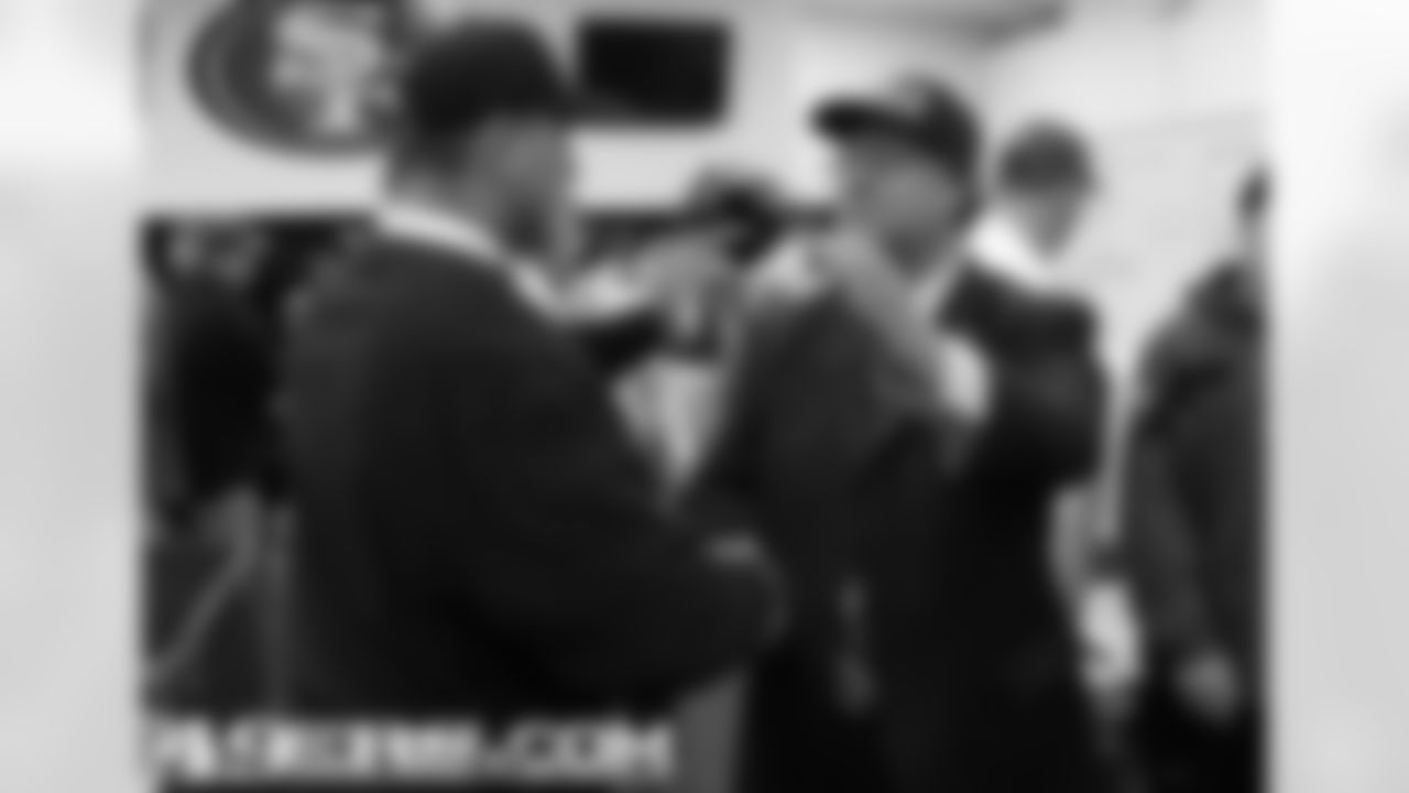 Jim Harbaugh and 49ers owner Dr. John York