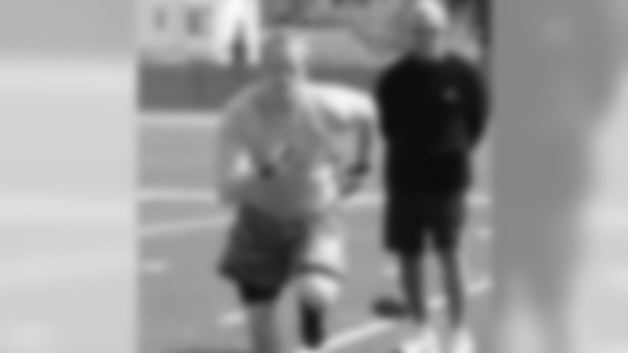 TE Billy Bajema runs a route under the watchful eye of Coach Pete Hoener
