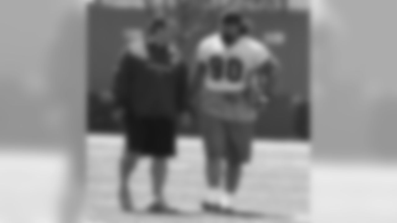 Isaac Sopoaga gets some tips from defensive line coach Jim Tomsula
