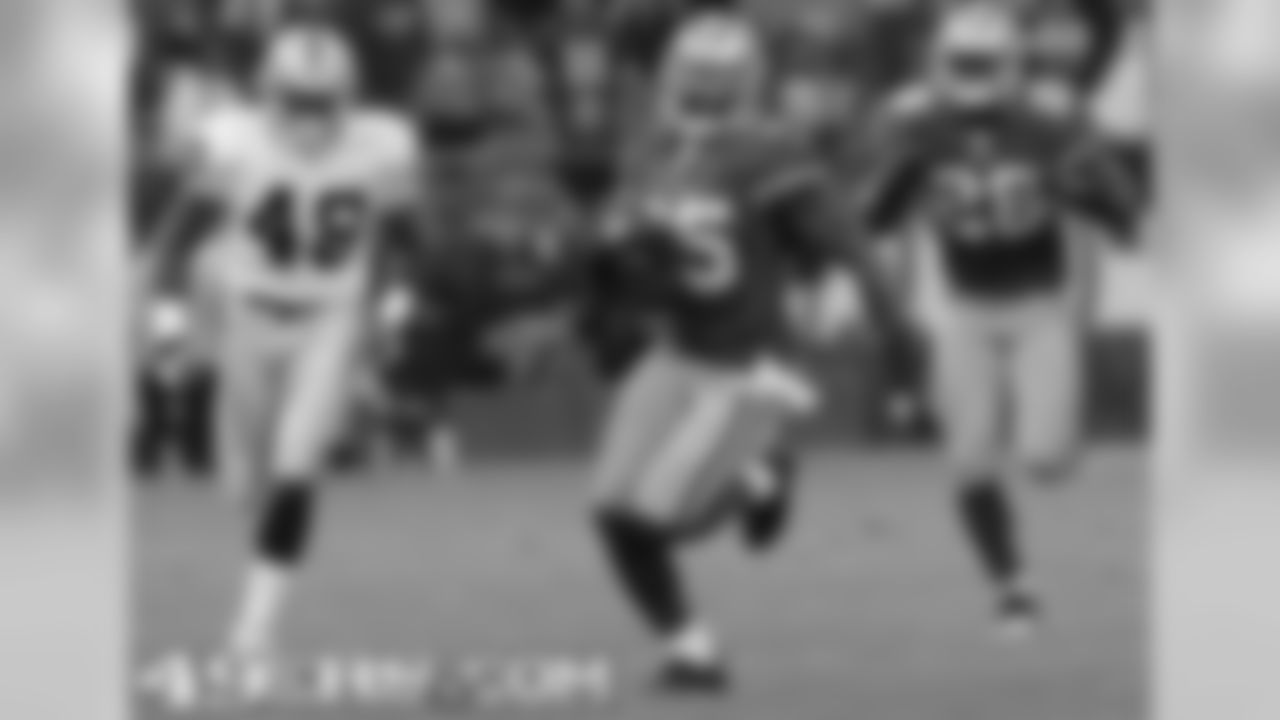 CB Phillip Adams returns a punt
