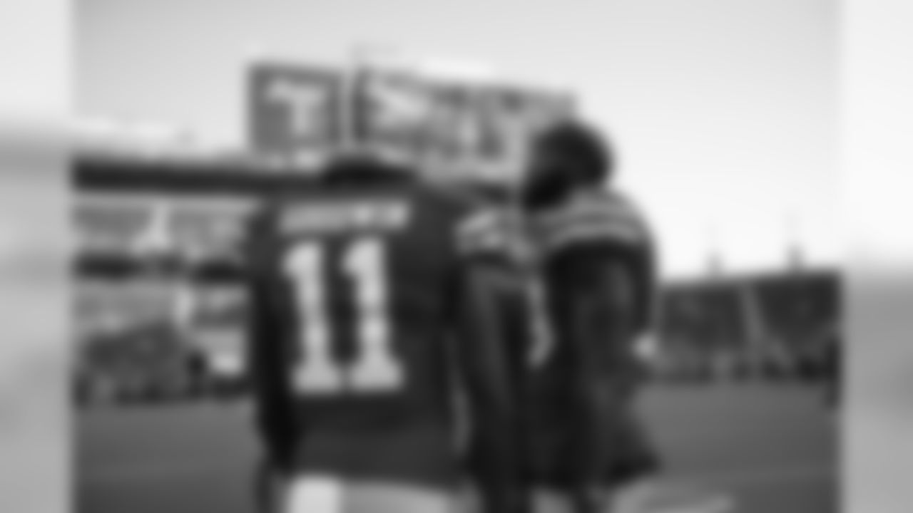 WR Marquise Goodwin and WR Aldrick Robinson