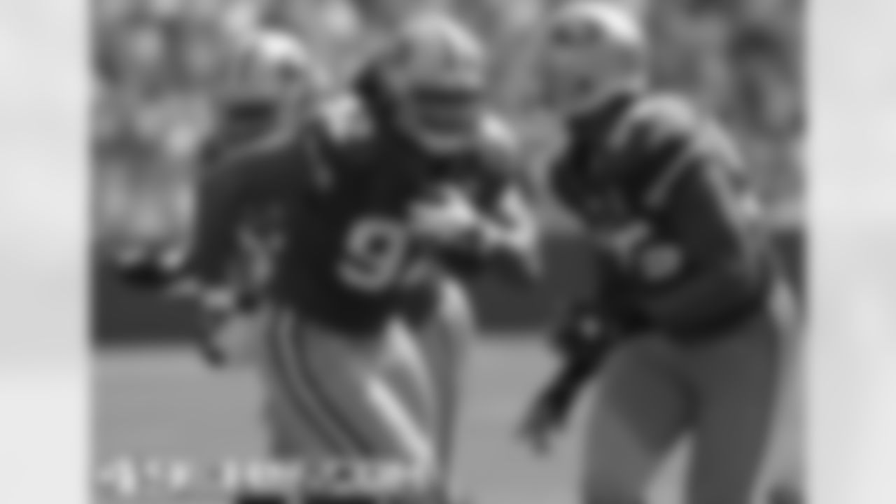 DT Will Tukuafu runs with a fumble recovery
