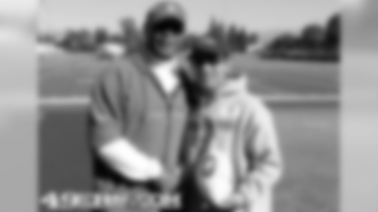 Make-A-Wish Kid Gabriel Costa and Head Coach Mike Singletary