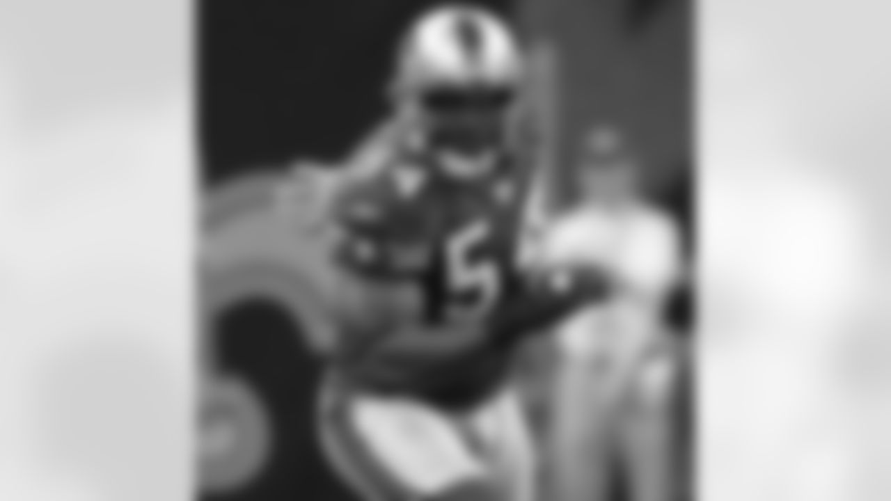 DE/LB Rod Green chases after Drew Brees