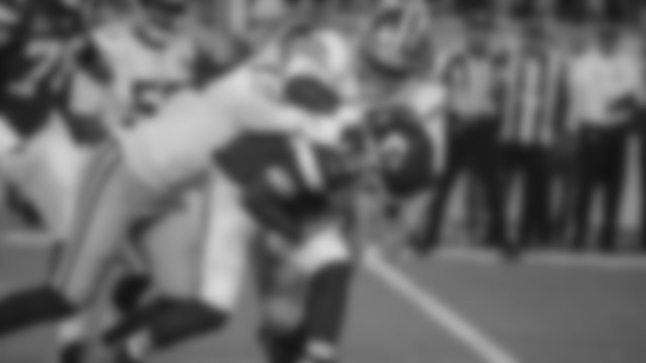 DL Earl Mitchell and DL DeForest Buckner
