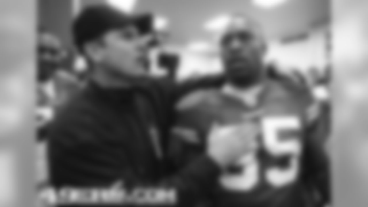 Coach Jim Harbaugh and TE Vernon Davis